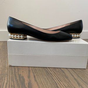 Black leather flat with pearl heel detail